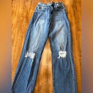 kancan jeans. size 0. rips in both knees.